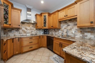Nestled amidst mature landscaping, this home offers serene views on Pelicans Nest Golf Club in Florida - for sale on GolfHomes.com, golf home, golf lot