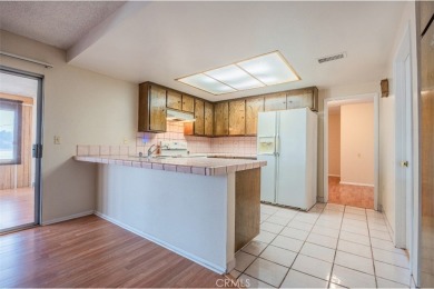 This inviting single-family home offers 2 bedrooms and 2 full on Cherry Hills Golf Club in California - for sale on GolfHomes.com, golf home, golf lot