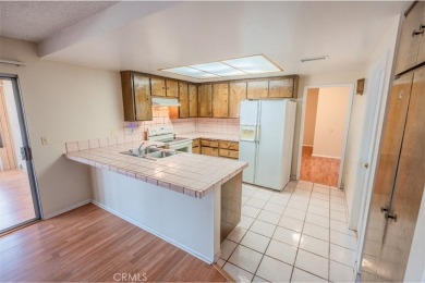 This inviting single-family home offers 2 bedrooms and 2 full on Cherry Hills Golf Club in California - for sale on GolfHomes.com, golf home, golf lot