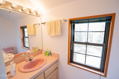 Discover this beautifully maintained contemporary home in The on The Hideout Golf in Pennsylvania - for sale on GolfHomes.com, golf home, golf lot
