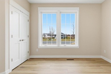 Discover this beautifully designed 2-bedroom, 2 -bath home in on The Jewel Golf Club in Minnesota - for sale on GolfHomes.com, golf home, golf lot