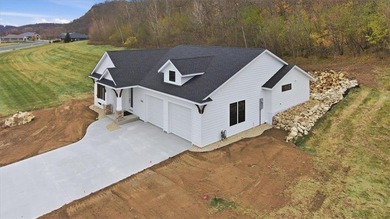 Discover this beautifully designed 2-bedroom, 2 -bath home in on The Jewel Golf Club in Minnesota - for sale on GolfHomes.com, golf home, golf lot