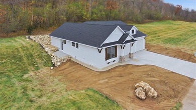 Discover this beautifully designed 2-bedroom, 2 -bath home in on The Jewel Golf Club in Minnesota - for sale on GolfHomes.com, golf home, golf lot