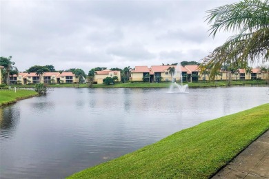 GATED COMMUNITY GROUND FLOOR LOCATION TILE FLOOR FULL SIZED on Oaks Country Club in Florida - for sale on GolfHomes.com, golf home, golf lot