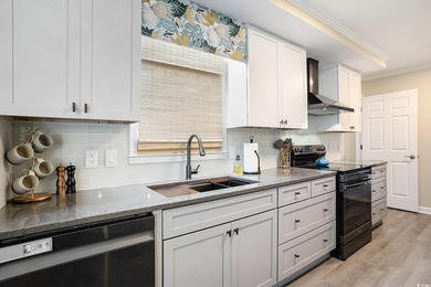 Beautifully updated 3BR/2.5BA home situated on the 18th fairway on Burning Ridge Golf Course in South Carolina - for sale on GolfHomes.com, golf home, golf lot