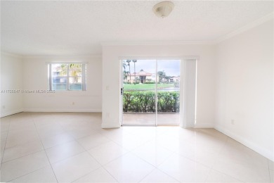 GATED COMMUNITY GROUND FLOOR LOCATION TILE FLOOR FULL SIZED on Oaks Country Club in Florida - for sale on GolfHomes.com, golf home, golf lot