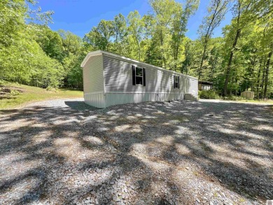 Are you in search of a budget-friendly lake retreat? If yes on Boots Randolph Golf Course in Kentucky - for sale on GolfHomes.com, golf home, golf lot