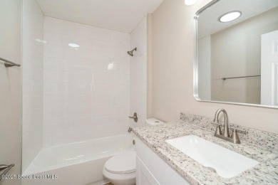 Step into this completely remodeled Washington model, nestled in on Indian River Colony Club in Florida - for sale on GolfHomes.com, golf home, golf lot