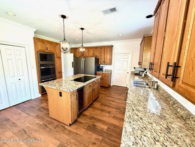 Perfectly positioned on a double lot along the Pine Golf on Diamondhead Country Club in Mississippi - for sale on GolfHomes.com, golf home, golf lot