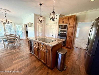 Perfectly positioned on a double lot along the Pine Golf on Diamondhead Country Club in Mississippi - for sale on GolfHomes.com, golf home, golf lot