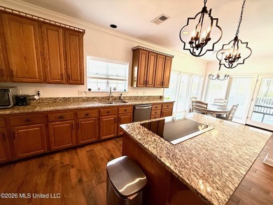 Perfectly positioned on a double lot along the Pine Golf on Diamondhead Country Club in Mississippi - for sale on GolfHomes.com, golf home, golf lot