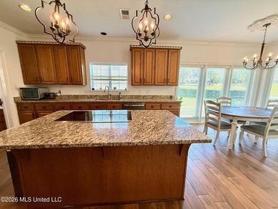 Perfectly positioned on a double lot along the Pine Golf on Diamondhead Country Club in Mississippi - for sale on GolfHomes.com, golf home, golf lot