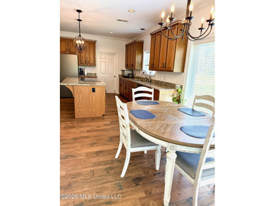 Perfectly positioned on a double lot along the Pine Golf on Diamondhead Country Club in Mississippi - for sale on GolfHomes.com, golf home, golf lot