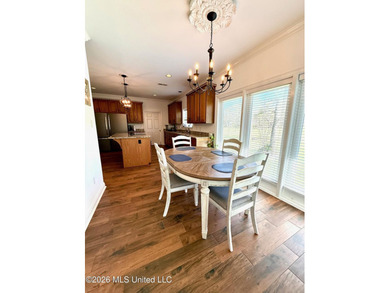 Perfectly positioned on a double lot along the Pine Golf on Diamondhead Country Club in Mississippi - for sale on GolfHomes.com, golf home, golf lot