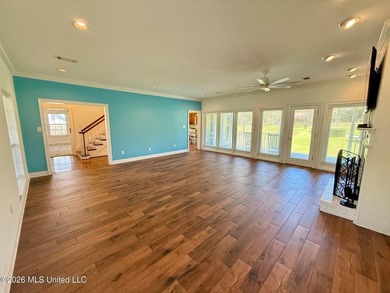 Perfectly positioned on a double lot along the Pine Golf on Diamondhead Country Club in Mississippi - for sale on GolfHomes.com, golf home, golf lot