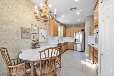 Experience the charm of this delightful home located in the on Miromar Lakes Golf Club in Florida - for sale on GolfHomes.com, golf home, golf lot