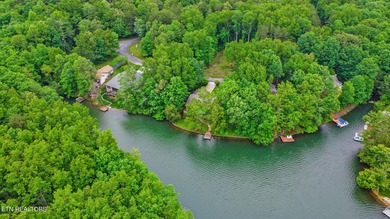 Experience peaceful lake life living on the quiet and beautiful on Dorchester Country Club in Tennessee - for sale on GolfHomes.com, golf home, golf lot