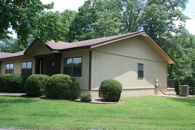 Enjoy low-maintenance living in this charming one-level townhome on Bella Vista - Metfield Golf Complex and Country Club in Arkansas - for sale on GolfHomes.com, golf home, golf lot