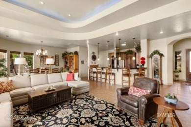 GORGEOUS HOME overlooking the 18th hole of the Falcon Ridge Golf on Falcon Ridge Golf Course in Nevada - for sale on GolfHomes.com, golf home, golf lot