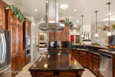 GORGEOUS HOME overlooking the 18th hole of the Falcon Ridge Golf on Falcon Ridge Golf Course in Nevada - for sale on GolfHomes.com, golf home, golf lot