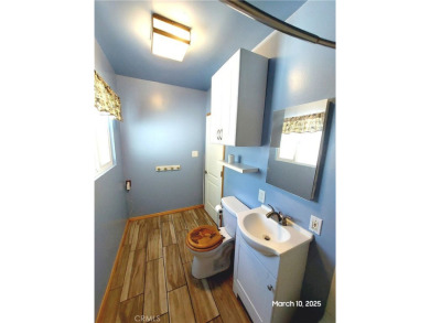 Nestled in the charming Moonridge community of Big Bear, this on Big Bear Mountain Ski and Golf Resort in California - for sale on GolfHomes.com, golf home, golf lot
