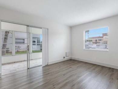 This beautifully updated condo features a stunning kitchen with on Kings Point Golf -Flanders Way in Florida - for sale on GolfHomes.com, golf home, golf lot