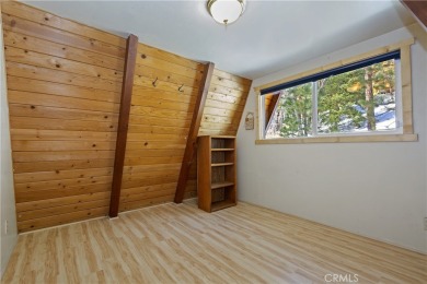 Nestled in the charming Moonridge community of Big Bear, this on Big Bear Mountain Ski and Golf Resort in California - for sale on GolfHomes.com, golf home, golf lot