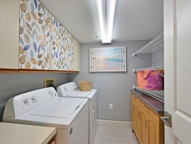 Enjoy spectacular sunrises AND sunsets from this luxury end unit on Pinebrook/Ironwood Golf Course in Florida - for sale on GolfHomes.com, golf home, golf lot