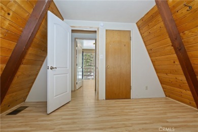 Nestled in the charming Moonridge community of Big Bear, this on Big Bear Mountain Ski and Golf Resort in California - for sale on GolfHomes.com, golf home, golf lot