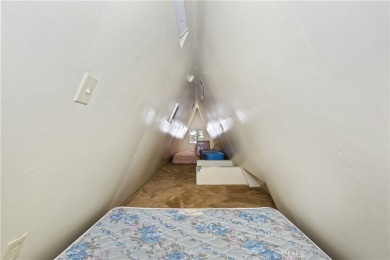 Nestled in the charming Moonridge community of Big Bear, this on Big Bear Mountain Ski and Golf Resort in California - for sale on GolfHomes.com, golf home, golf lot