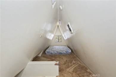 Nestled in the charming Moonridge community of Big Bear, this on Big Bear Mountain Ski and Golf Resort in California - for sale on GolfHomes.com, golf home, golf lot