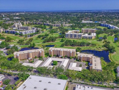 Enjoy spectacular sunrises AND sunsets from this luxury end unit on Pinebrook/Ironwood Golf Course in Florida - for sale on GolfHomes.com, golf home, golf lot