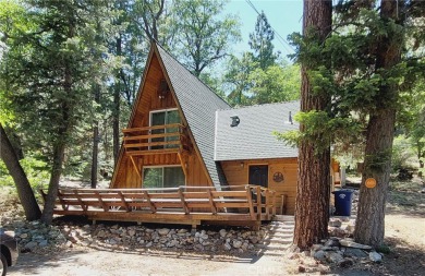 Nestled in the charming Moonridge community of Big Bear, this on Big Bear Mountain Ski and Golf Resort in California - for sale on GolfHomes.com, golf home, golf lot