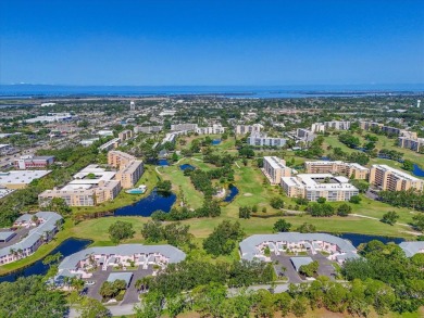 Enjoy spectacular sunrises AND sunsets from this luxury end unit on Pinebrook/Ironwood Golf Course in Florida - for sale on GolfHomes.com, golf home, golf lot