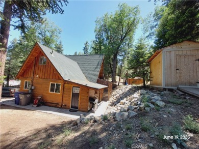 Nestled in the charming Moonridge community of Big Bear, this on Big Bear Mountain Ski and Golf Resort in California - for sale on GolfHomes.com, golf home, golf lot