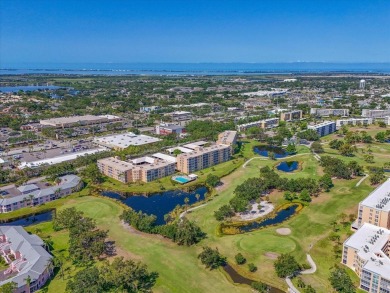 Enjoy spectacular sunrises AND sunsets from this luxury end unit on Pinebrook/Ironwood Golf Course in Florida - for sale on GolfHomes.com, golf home, golf lot