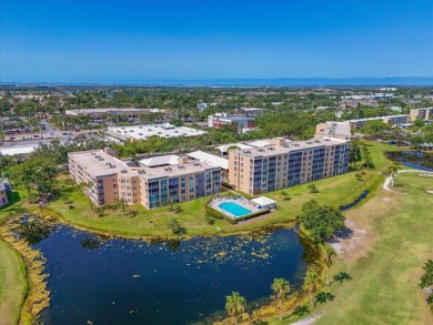 Enjoy spectacular sunrises AND sunsets from this luxury end unit on Pinebrook/Ironwood Golf Course in Florida - for sale on GolfHomes.com, golf home, golf lot