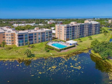 Enjoy spectacular sunrises AND sunsets from this luxury end unit on Pinebrook/Ironwood Golf Course in Florida - for sale on GolfHomes.com, golf home, golf lot