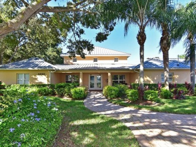 Enjoy spectacular sunrises AND sunsets from this luxury end unit on Pinebrook/Ironwood Golf Course in Florida - for sale on GolfHomes.com, golf home, golf lot