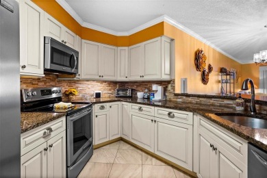 Experience the pinnacle of Florida Gulfcoast living in this on Isla Del Sol Yacht and Country Club in Florida - for sale on GolfHomes.com, golf home, golf lot