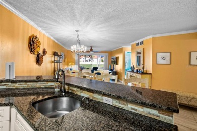 Experience the pinnacle of Florida Gulfcoast living in this on Isla Del Sol Yacht and Country Club in Florida - for sale on GolfHomes.com, golf home, golf lot