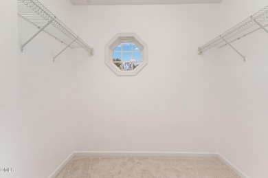 Step into this charming home located in the highly sought-after on Eagle Ridge Golf Course in North Carolina - for sale on GolfHomes.com, golf home, golf lot