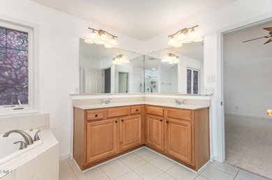 Step into this charming home located in the highly sought-after on Eagle Ridge Golf Course in North Carolina - for sale on GolfHomes.com, golf home, golf lot