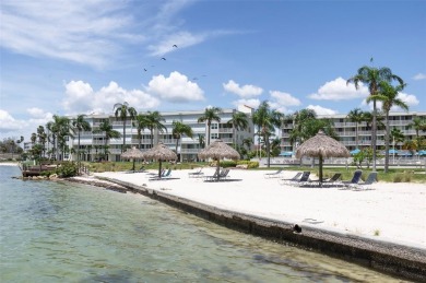 Experience the pinnacle of Florida Gulfcoast living in this on Isla Del Sol Yacht and Country Club in Florida - for sale on GolfHomes.com, golf home, golf lot