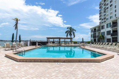 Experience the pinnacle of Florida Gulfcoast living in this on Isla Del Sol Yacht and Country Club in Florida - for sale on GolfHomes.com, golf home, golf lot