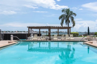 Experience the pinnacle of Florida Gulfcoast living in this on Isla Del Sol Yacht and Country Club in Florida - for sale on GolfHomes.com, golf home, golf lot
