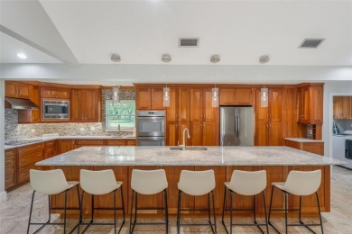 Located in the desirable Golf and Country Club community of on Tuscawilla Country Club in Florida - for sale on GolfHomes.com, golf home, golf lot