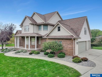 Nestled among the scenic Hi-Mark golf couse, this stunning on Pine Lake Golf and Tennis Club in Nebraska - for sale on GolfHomes.com, golf home, golf lot