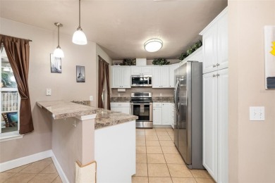 Welcome to the only two-story home in the gated Creekside Villas on Turkey Creek Golf and Country Club in Florida - for sale on GolfHomes.com, golf home, golf lot
