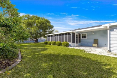 PRICE IMPROVEMENT ON THIS UNIQUE MAPLE MODEL, being offered as on The Links of Spruce Creek in Florida - for sale on GolfHomes.com, golf home, golf lot
